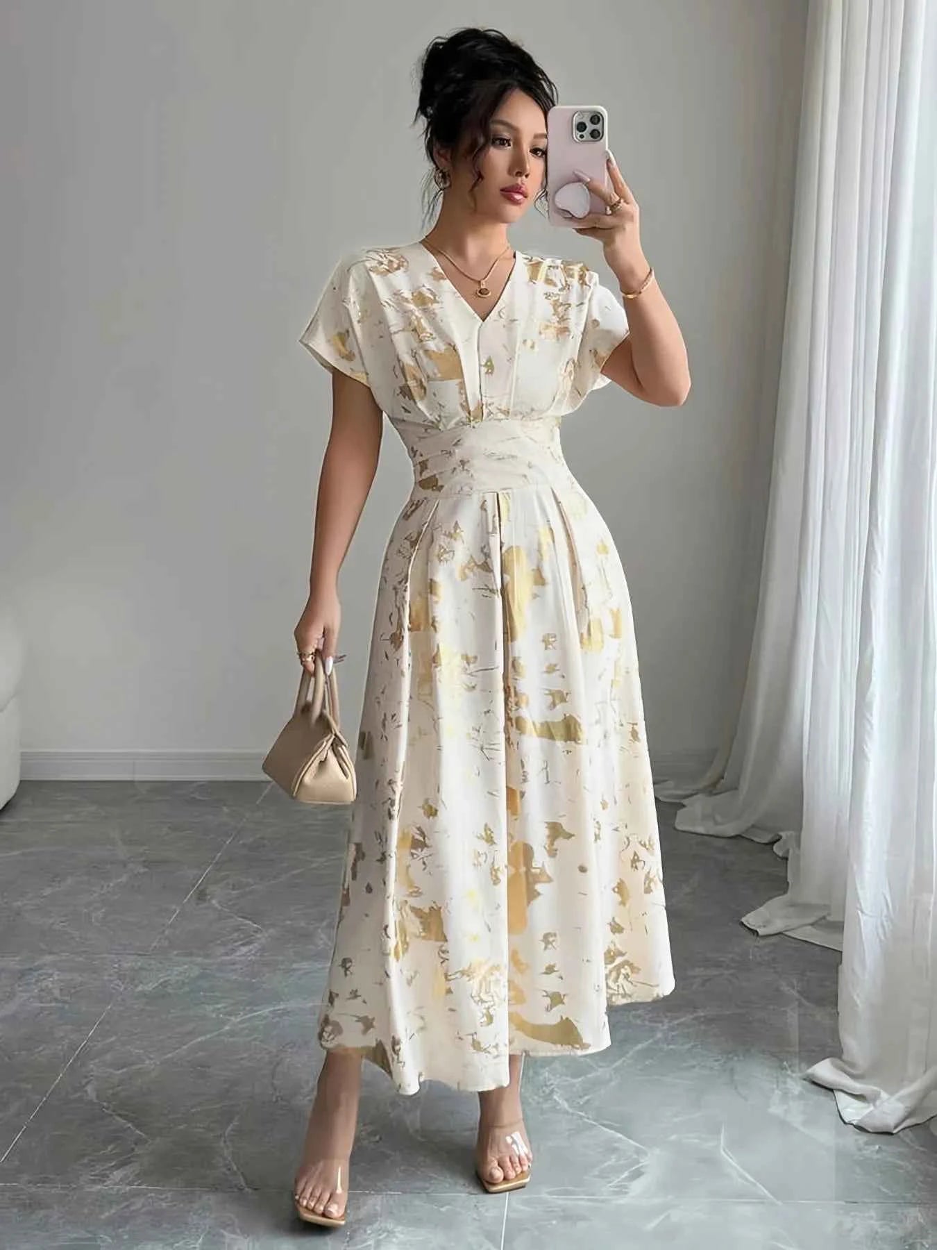 Printed V-Neck Short Sleeve Dress fcf23eec-ee15-4cc1-b29c-4c8cda1563a1-Max-Origin