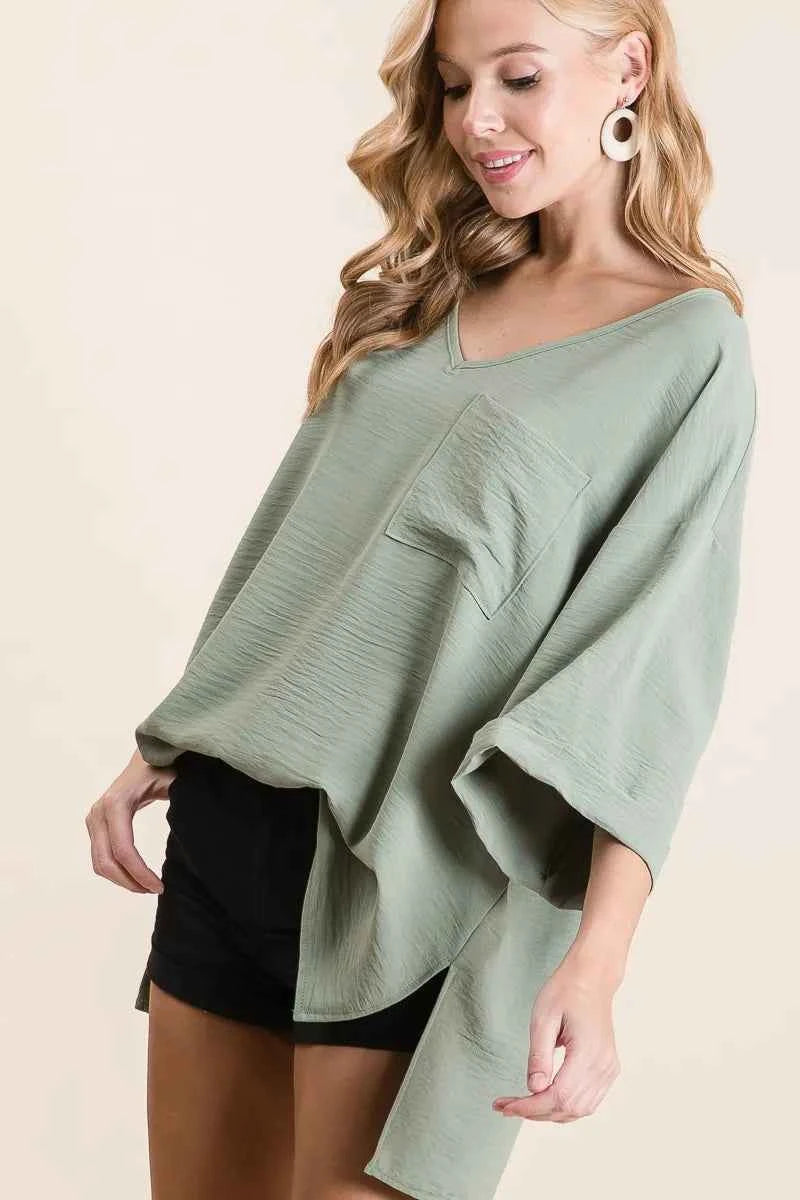 Flowy Woven V-Neck Top with Rolled Up Cuffs fd5e13efa61c48c889c61ca58e70bde3-Max-Origin